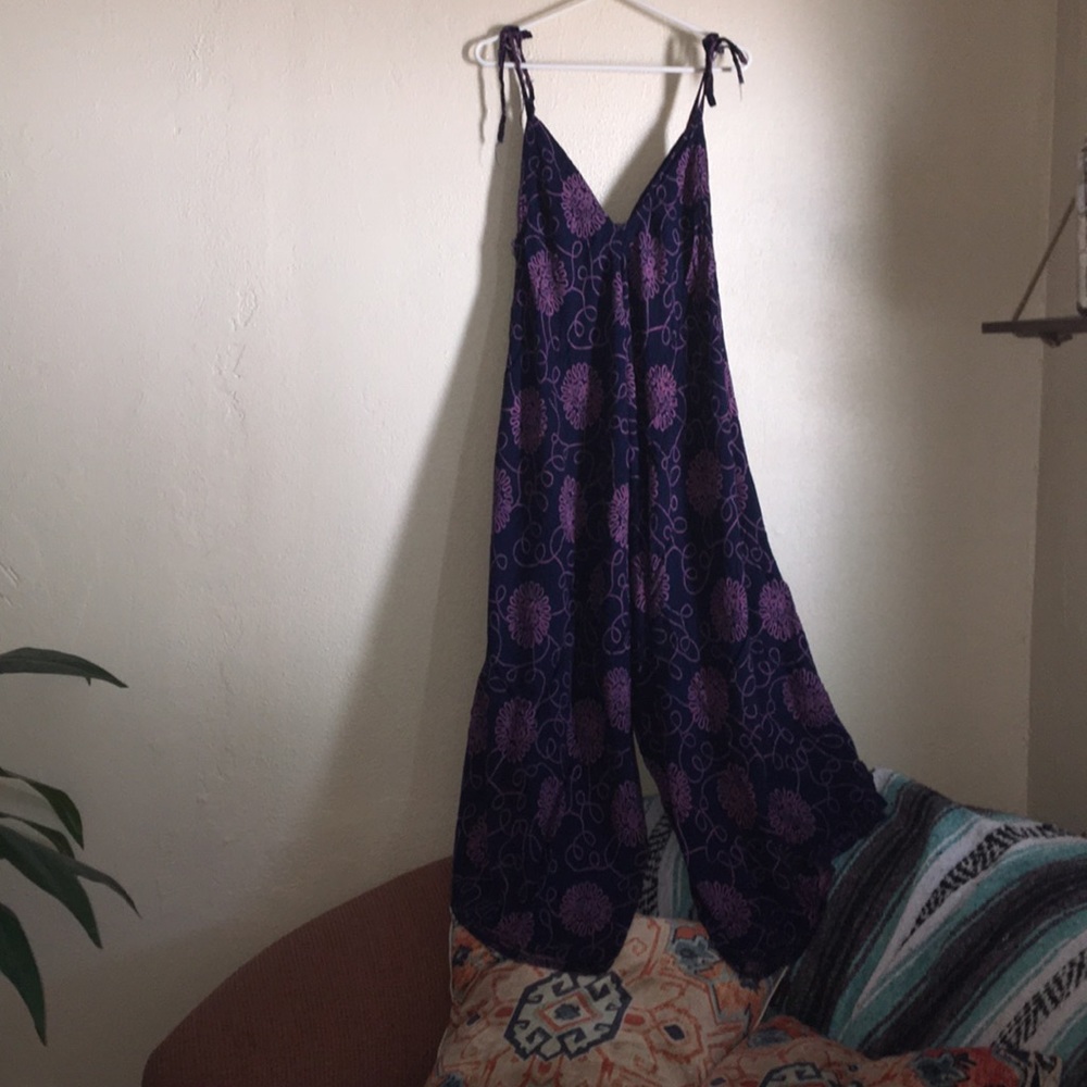 Worn Balinese romp. Perfect for climbing a tree